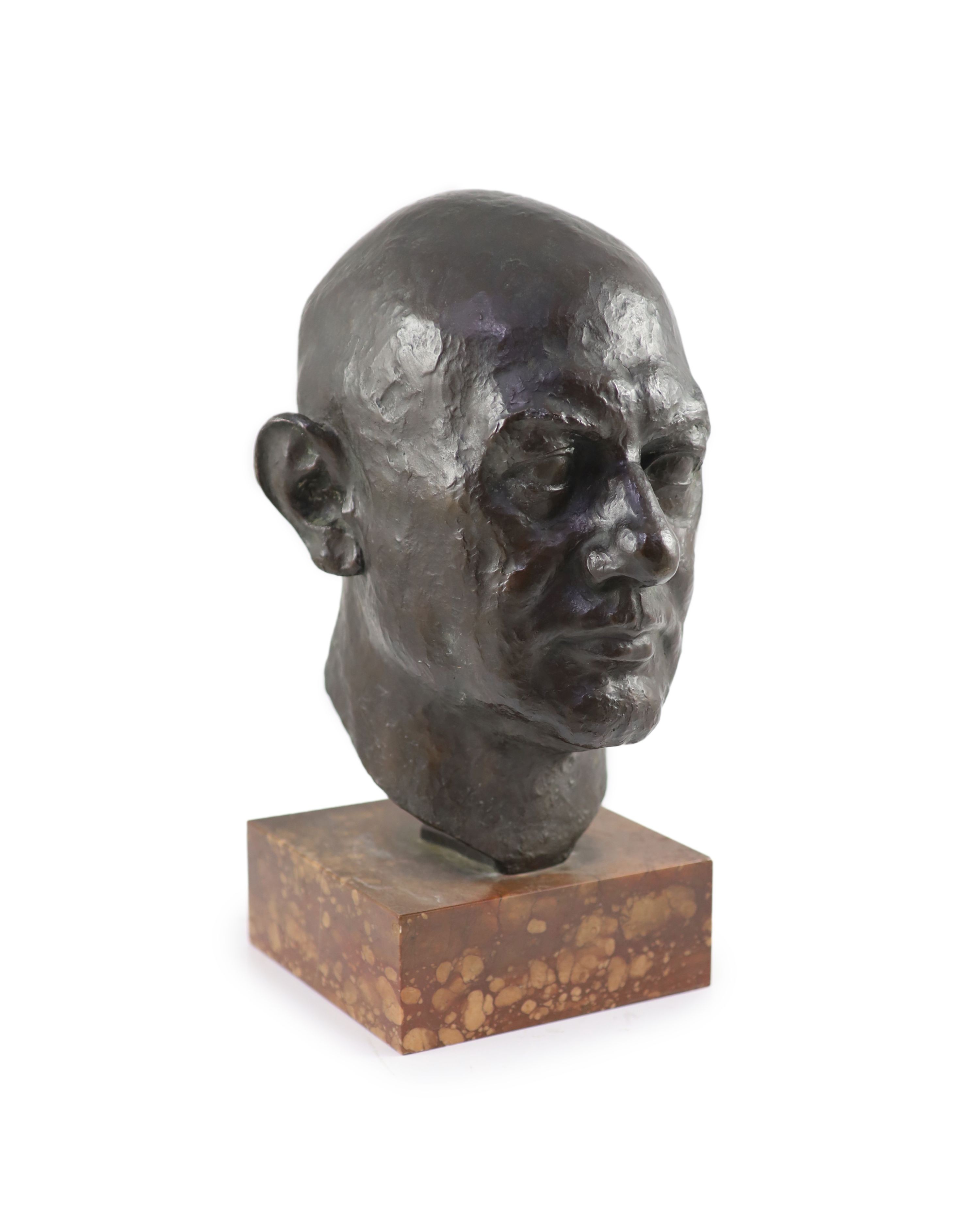 Turi Weinmann, (German, 1883-1950). A lifesize bronze head study, possibly a self-portrait of the artist, H 39cm overall.